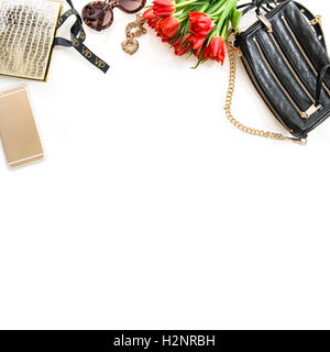Fashion still life with accessories, flowers, phone. Feminine objects on white background Stock Photo