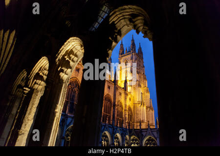 Canterbury Cathedral viewed from the cloisters, Kent, floodlit at night Stock Photo