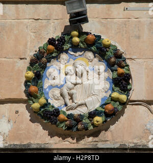Ceramic wall plaque of Madonna and Child in the ancient city of Mdina on the island of Malta Stock Photo