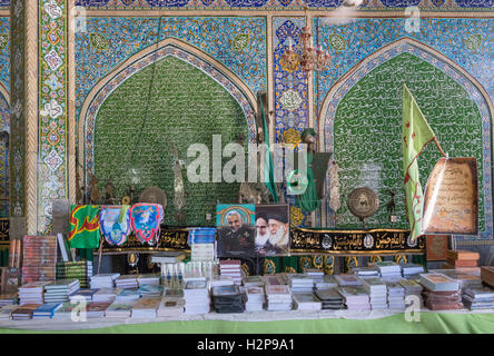 Kerman, Bazaar Shop, Religious Books, Alam & Pictures Of Supreme Leaders Stock Photo