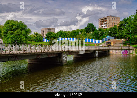 Pedestrian bridge on Nizhny pond. Kaliningrad Stock Photo