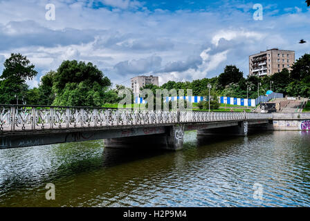 Pedestrian bridge on Nizhny pond. Kaliningrad Stock Photo