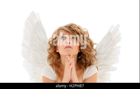 praying teenage angel girl or young woman Stock Photo