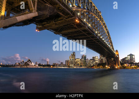 Sydney Opera House and the Sydney Central Business DIstrict framed by the Sydney Harbour Bridge Stock Photo