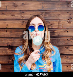 Cool hipster student woman wearing eyewear glasses. Stock Photo