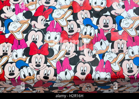 Christmas shoeboxes wrapped in wrapping paper with Donald Duck, Mickie & Minnie Mouse for charity for children not so privileged Stock Photo