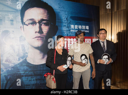 Hong Kong, Hong Kong S.A.R, China. 27th May, 2016. Refugees Ajith Puspa and Vanessa Mae Rodel(L) with their lawyer Jonathan Man(R) join the audience at the Hong Kong Premiere of the Oliver Stone Film ''Snowden''.Ajith and Vanessa were responsible for hiding Edward Snowden during his time evading capture in the Asian city. © Jayne Russell/ZUMA Wire/Alamy Live News Stock Photo