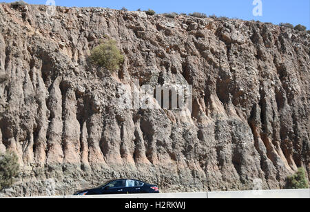 Oct 1, 2016, 2016. Palmdale CA, The San Andreas Fault is visible along the 14 freeway in Palmdale California Saturday. A swarm of earthquakes that rattled the Salton Sea area earlier this week has increased the probability of a major quake hitting Southern California.The California Office of Emergency Services (OES) issued an earthquake advisory warning residents and officials in Ventura, San Diego, San Bernardino, Riverside, Orange, Los Angeles, Kern and Imperial counties that there was a greater possibility of a major earthquake through Oct. 4.More than 140 seismic events have been rec Stock Photo