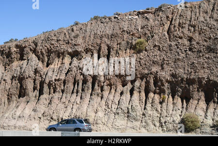 Oct 1, 2016, 2016. Palmdale CA, The San Andreas Fault is visible along the 14 freeway in Palmdale California Saturday. A swarm of earthquakes that rattled the Salton Sea area earlier this week has increased the probability of a major quake hitting Southern California.The California Office of Emergency Services (OES) issued an earthquake advisory warning residents and officials in Ventura, San Diego, San Bernardino, Riverside, Orange, Los Angeles, Kern and Imperial counties that there was a greater possibility of a major earthquake through Oct. 4.More than 140 seismic events have been rec Stock Photo