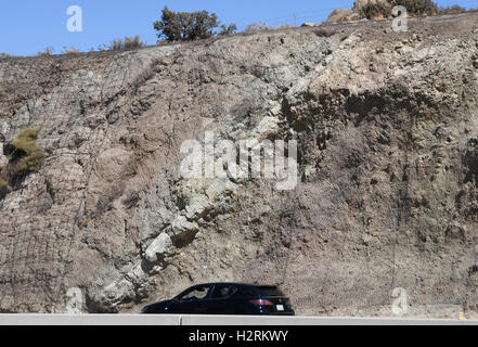 Oct 1, 2016, 2016. Palmdale CA, The San Andreas Fault is visible along the 14 freeway in Palmdale California Saturday. A swarm of earthquakes that rattled the Salton Sea area earlier this week has increased the probability of a major quake hitting Southern California.The California Office of Emergency Services (OES) issued an earthquake advisory warning residents and officials in Ventura, San Diego, San Bernardino, Riverside, Orange, Los Angeles, Kern and Imperial counties that there was a greater possibility of a major earthquake through Oct. 4.More than 140 seismic events have been rec Stock Photo