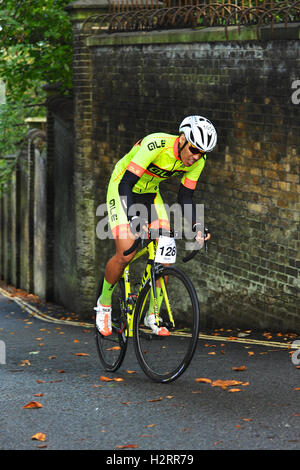 London, UK. 01st Oct, 2016. Tim O'Rourke (Imperial Racing Team), a cyclist competing in the Rollapaluza Urban Hill Climb competition aggressively tacking the steepest section of the course.  The event took place on Swain’s Lane, arguably the most famous and notoriously challenging climb in London. . Credit:  Michael Preston/Alamy Live News Stock Photo