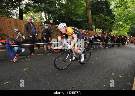 London, UK. 01st Oct, 2016. A cyclist competing in the Rollapaluza Urban Hill Climb competition aggressively tacking the steepest section of the course.  The event took place on Swain’s Lane, arguably the most famous and notoriously challenging climb in London. . Credit:  Michael Preston/Alamy Live News Stock Photo