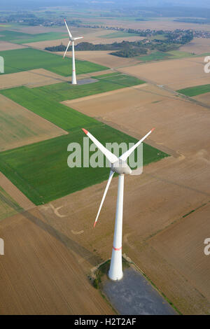 AERIAL VIEW. 198-meter-high Enercon E-126 wind turbines. Estinnes, Province of Hainaut, Wallonia, Belgium. Stock Photo