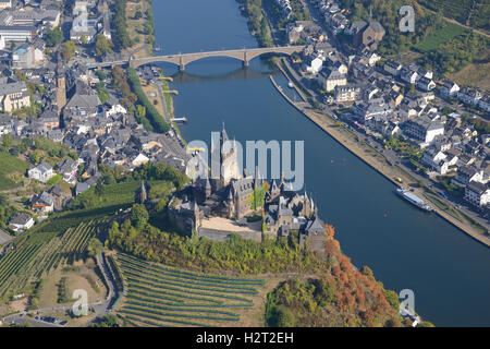 AERIAL VIEW. Cochem Castle overlooking the Mosel River. Reichsburg Cochem, Rhineland-Palatinate, Germany. Stock Photo
