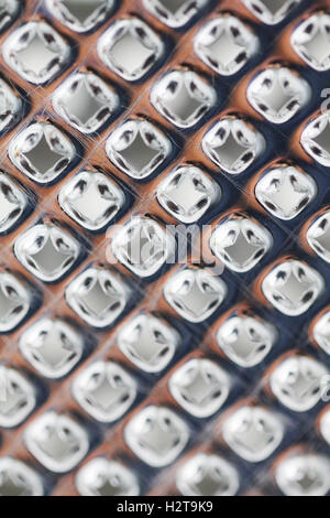 Steel cooking graiter close up macro photo Stock Photo