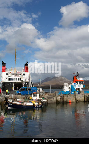 Isle of Islay, Scotland. Picturesque view of the CalMac ferry, MV Finlaggan, docked at Islay’s Port Askaig Stock Photo