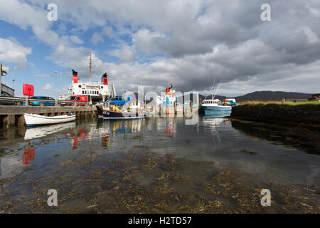 Isle of Islay, Scotland. Picturesque view of the CalMac ferry, MV Finlaggan, docked at Islay’s Port Askaig Stock Photo