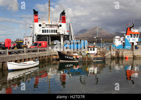 Isle of Islay, Scotland. Picturesque view of the CalMac ferry, MV Finlaggan, docked at Islay’s Port Askaig Stock Photo