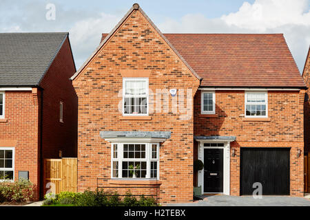 New build modern home by  David Wilson Homes a detached house in Wilmslow South Manchester Cheshire England UK Stock Photo