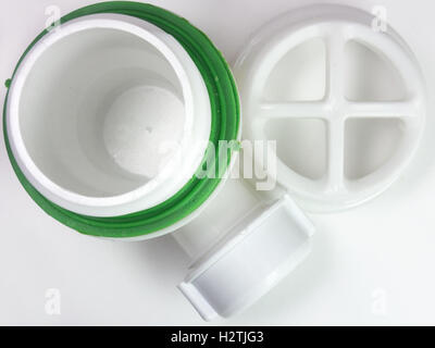 Plastic strainer for drain for hole of the sink. A fragment of the drain system Stock Photo