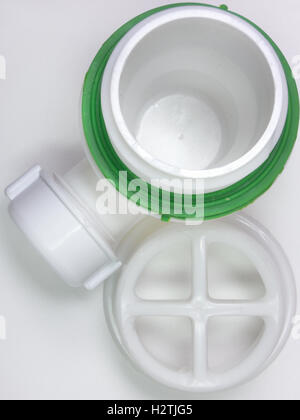 Plastic strainer for drain for hole of the sink. A fragment of the drain system Stock Photo