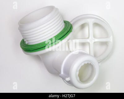 Plastic strainer for drain for hole of the sink. A fragment of the drain system Stock Photo