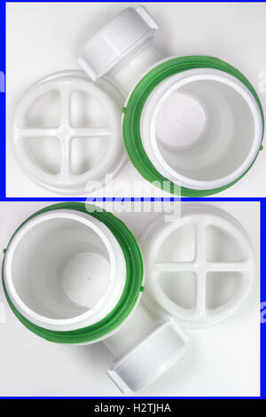 Pair of plastic strainer for drain for hole of the sink. A fragment of the drain system Stock Photo