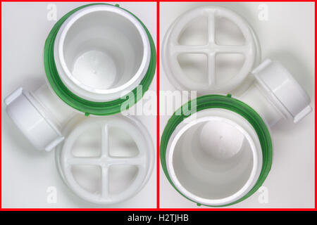 Pair of plastic strainer for drain for hole of the sink. A fragment of the drain system Stock Photo