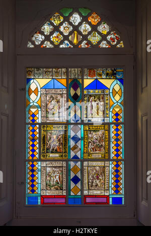 Sintra, Portugal - April 23, 2014: Stained glass window from Pena National Palace in Sintra, Portugal Stock Photo