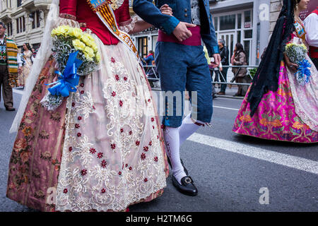 Detail of Believers during flower offering parade,People with Floral tributes to `Virgen de los desamparados´, Fallas festival,S Stock Photo