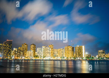 A night view of a section of Honolulu skyline viewed from Magic Island.