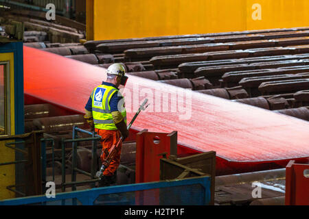 Red hot steel in steelworks being pressed Stock Photo