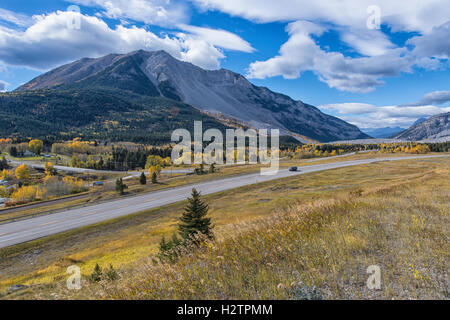 Highway 3 as it passes by Turtle Mountain and Frank Slide in the Crowsnest Pass, Alberta Canada Stock Photo