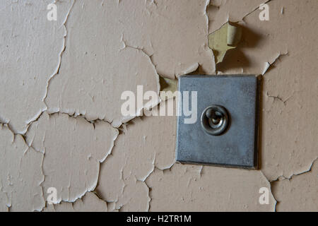 Old fashioned light switch inside Maiden Law Hospital Mortuary, Lanchester Rd, Lanchester, County Durham, UK Stock Photo