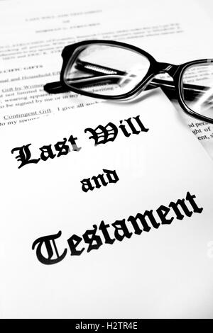 Envelope with Last Will and Testament and Reading Glasses Stock Photo
