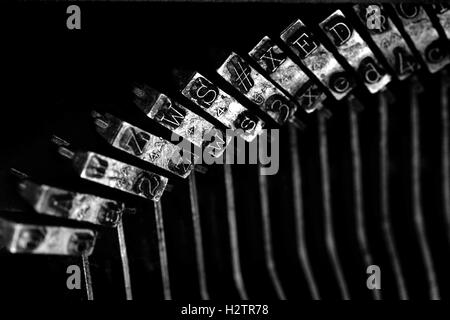 Detail closeup of old typewriter striker keys for writing communication Stock Photo