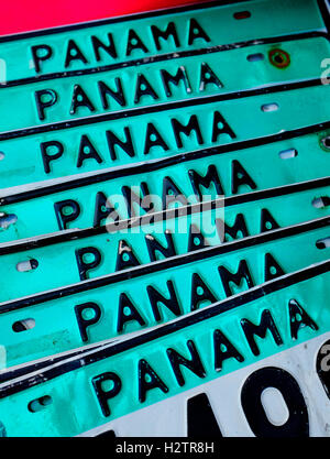 Detail of stack and row of Panama license plates for sale at market Stock Photo