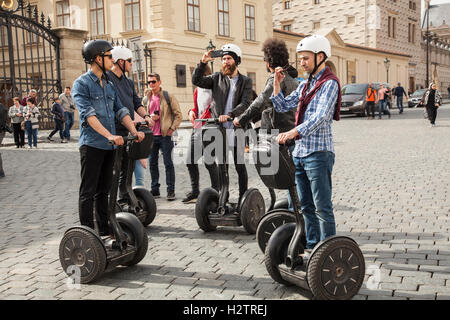 Segways riders at Prague Castle.Segways were Invented by Dean Karmen at the University of Plymouth, England Stock Photo