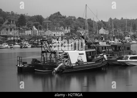 Long exposure of fishing boats in Tarbert Harbour, Scotland. Stock Photo