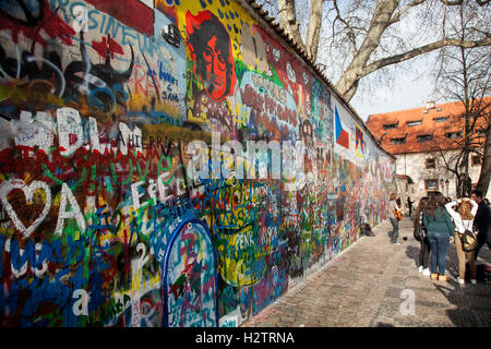 John Lennon wall in Prague. After his murder in 1980 it was a political graffiti protest by the young Czech. Stock Photo