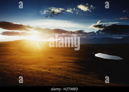 Mounains lake sunset aerial view Stock Photo