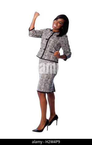 Beautiful happy cheering business woman celebrating joyfully, on white. Stock Photo