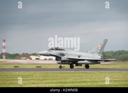 British Royal Air Force Typhoon FGR4 of No 1 Squadron Military Fighter Jet lines up on the runway to depart RAF Fairford at RIAT Stock Photo