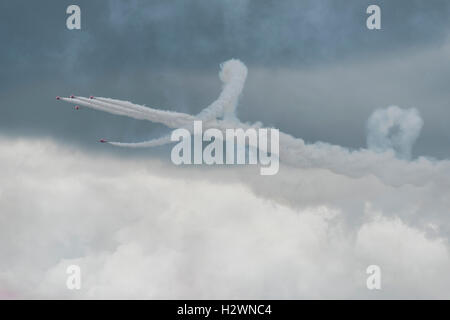 British Royal Air Force Red Arrows Aerobatic Display Team perform the Twister maneuver at the 2016 RIAT Stock Photo