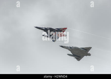 Two Dassault Mirage 2000N fighter jets make up the Ramex Delta display team from the French Armee de l'Air demonstrate at RIAT Stock Photo