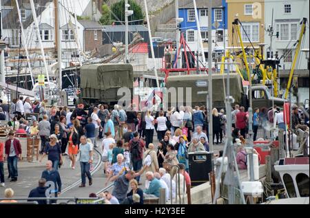 Harry Styles and Tom Hardy fans wait in Weymouth, Dorset as they are due to be filming the war movie Dunkirk. Weymouth harbour has period vehicles and boats for the WWII scenes. Many streets were closed and will remain closed tomorrow as filming continues Stock Photo