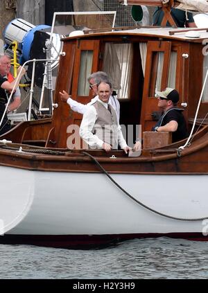 Harry Styles and Tom Hardy fans wait in Weymouth, Dorset as they are due to be filming the war movie Dunkirk. Weymouth harbour has period vehicles and boats for the WWII scenes. Many streets were closed and will remain closed tomorrow as filming continues Stock Photo