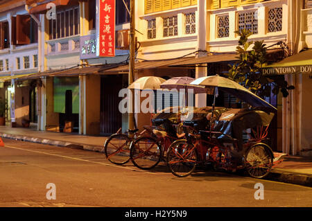 Georgetown, Penang, Malaysia - April 18, 2015: Classic local rickshaws in George Town, Penang in Malaysia Stock Photo