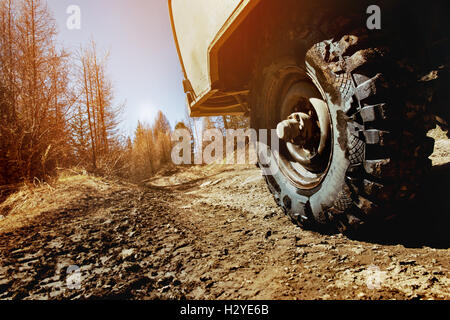 Wheel of car SUV on the offroad background Stock Photo