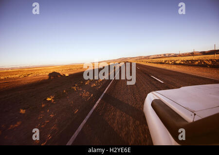 Car SUV on the straight road background Stock Photo